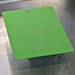 A green sheet metal with powder coating untreated by Laserline diode lasers