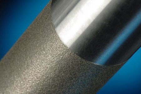 Close-up of a metal with a cladding finish by Laserline diode lasers