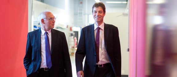 Christoph Ullmann and Volker Krause walking through Laserline production hall