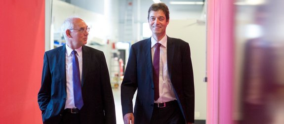 Christoph Ullmann and Volker Krause walking through Laserline production hall