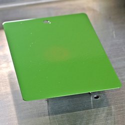 A green sheet metal with powder coating fully cured with laser curing by Laserline diode lasers