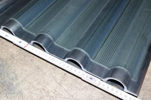 Finished membrane wall with anti-corroison coating measured with a ruler by Laserline diode lasers