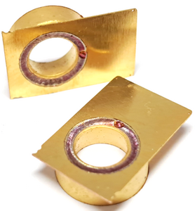 Two gold-coated copper electrical contacts wtih circular weld seams by Laserline diode lasers